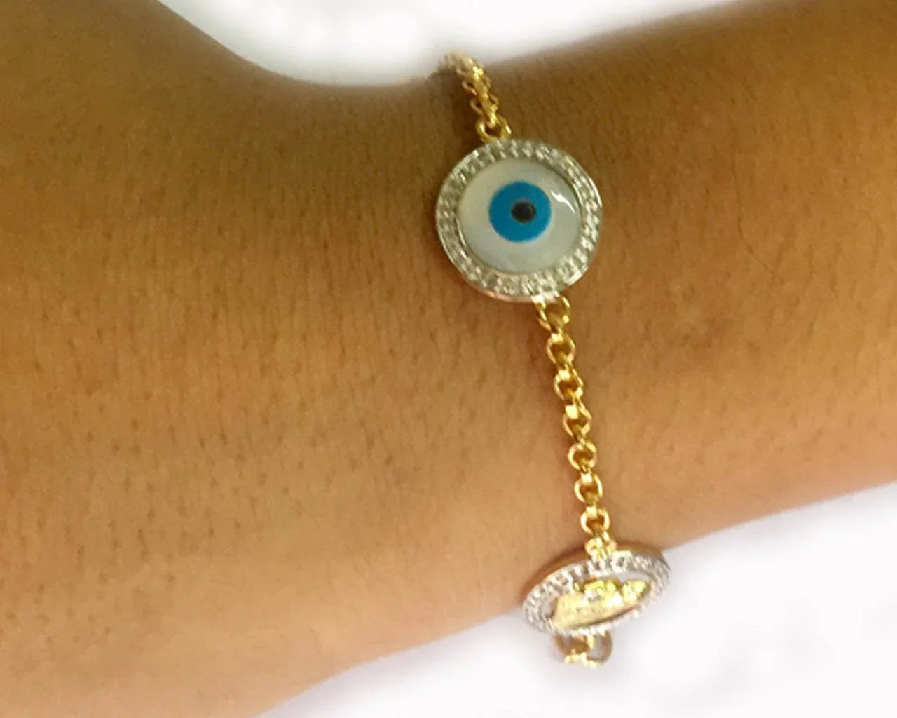 Evil Eye, Aum, Shiv Trishul and ShivLing and Sai Ram all in one, gold bracelet with diamonds - Jewelslane