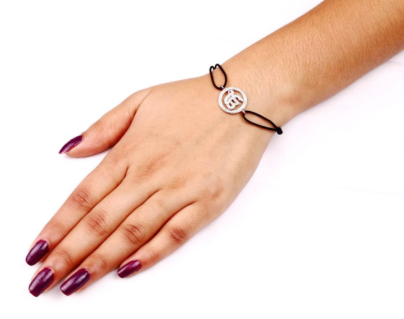 Ik Onkaar Bracelet in 925 Silver with Diamond on size adjustable Nylon Thread - Jewelslane