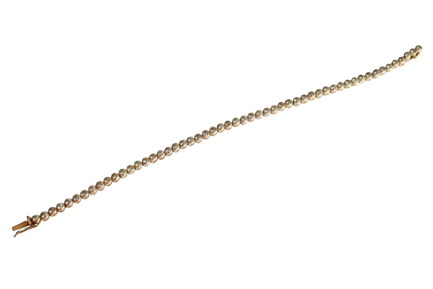 Diamond tennis bracelet in gold - Jewelslane