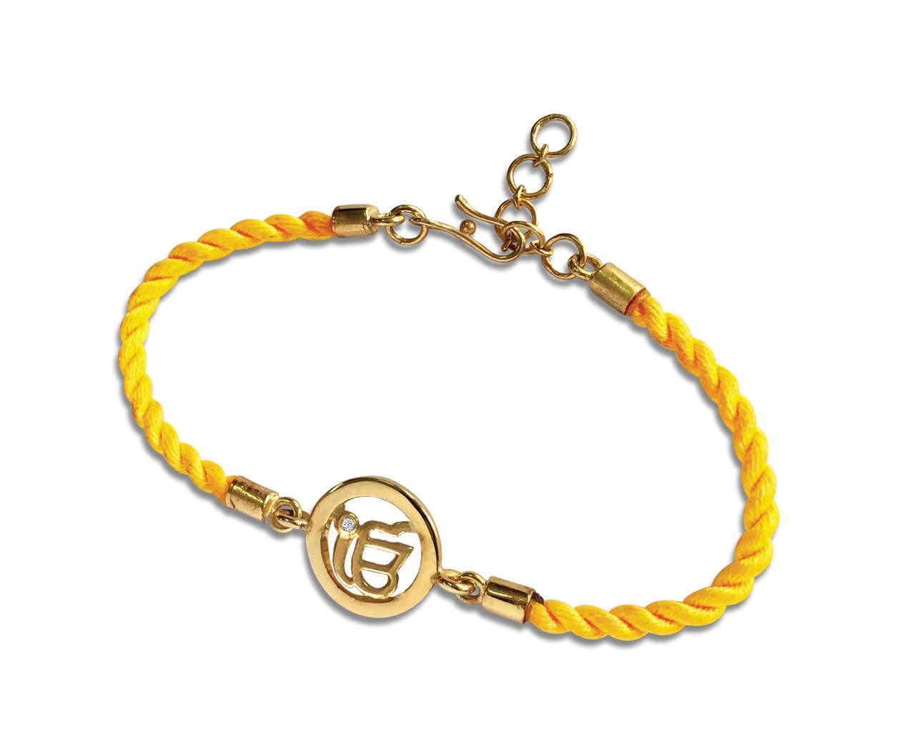 Ik onkaar Bracelet On Nylon Thread with Gold Plated Adjustable Silver Lock for Girls - Jewelslane