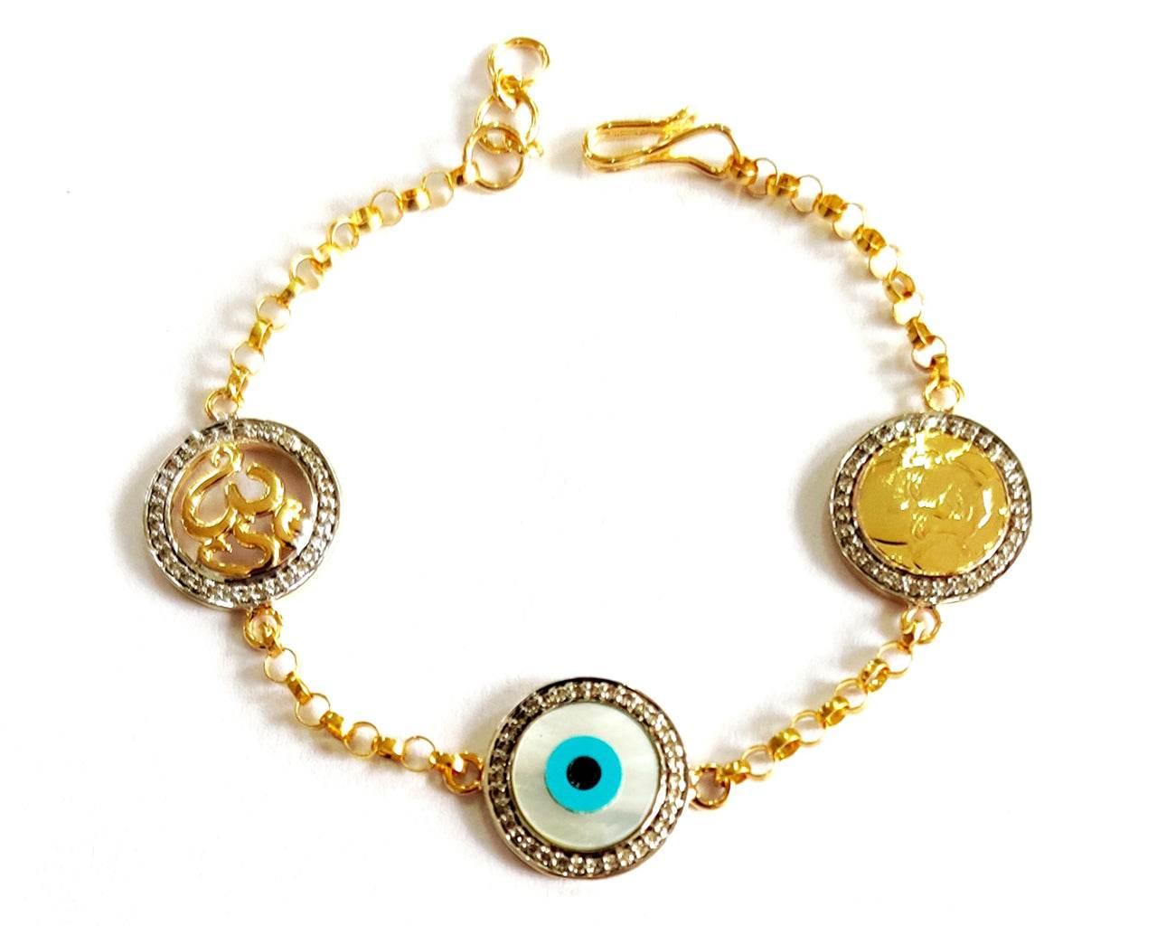 Auspicious Om, Evil Eye and Guruji Bracelet in gold with diamonds - Jewelslane