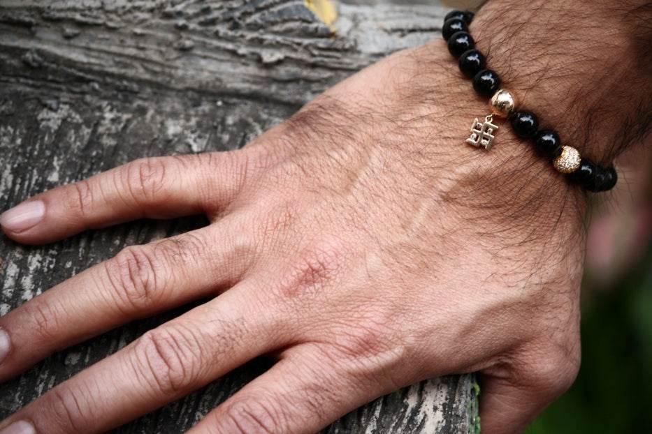 Swastik Bracelet in 14k Gold with Diamonds - Jewelslane