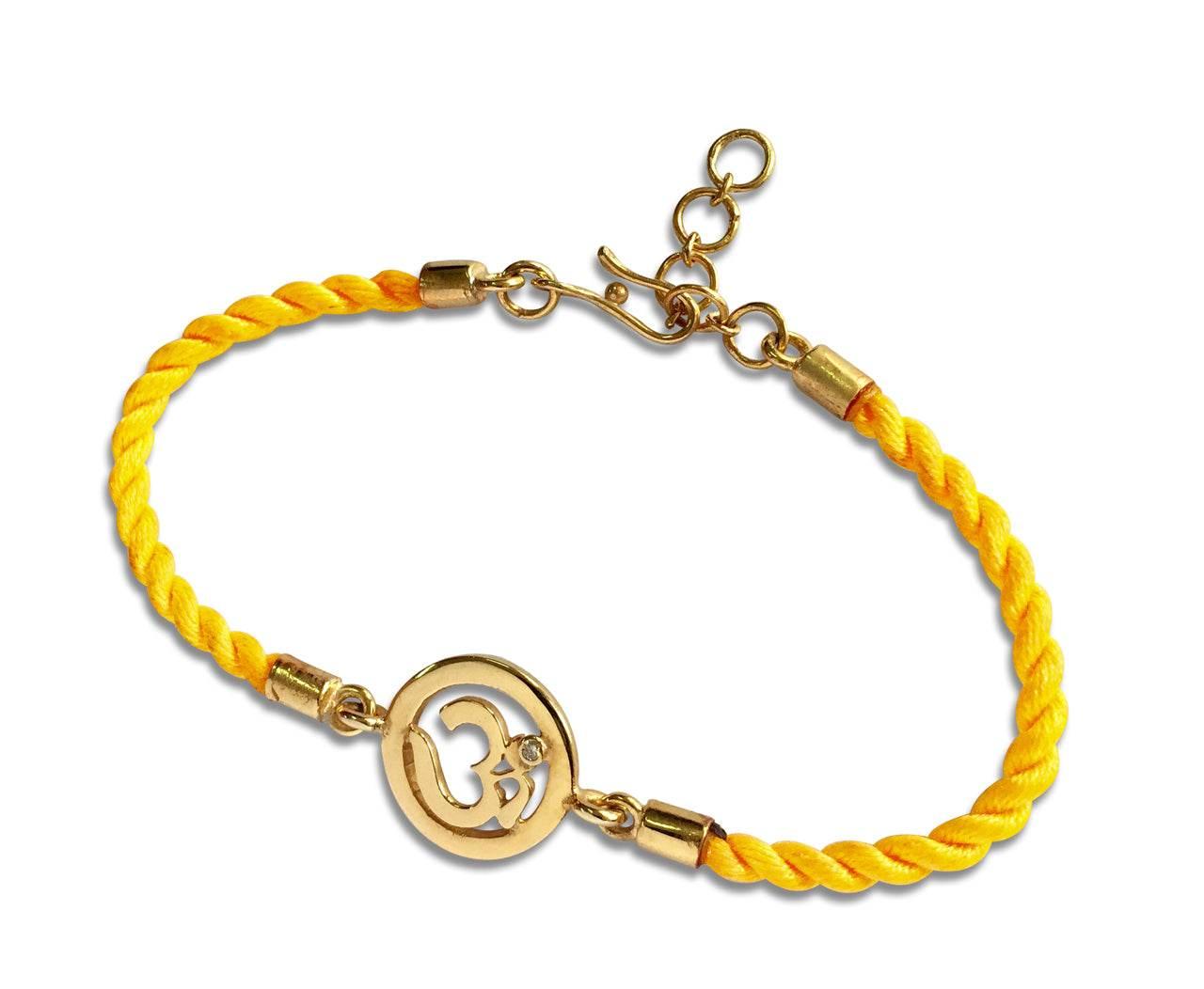 OM Bracelet On Nylon Thread with Gold Plated Adjustable Silver Lock for Girls - Jewelslane