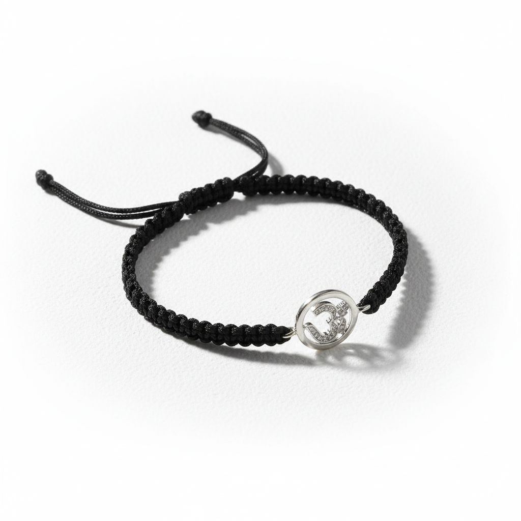Aum Bracelet in Silver with Diamonds on Nylon Braided Thread from Aumkaara - Jewelslane