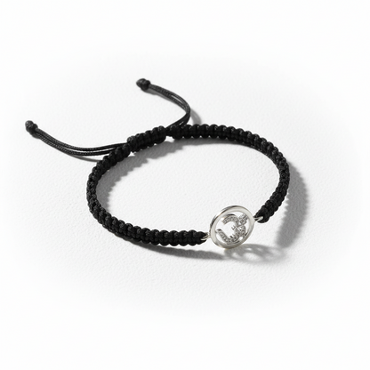 Aum Bracelet in Silver with Diamonds on Nylon Braided Thread from Aumkaara - Jewelslane