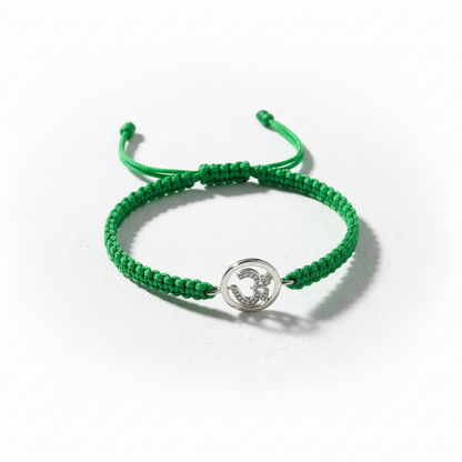 Aum Bracelet in Silver with Diamonds on Nylon Braided Thread from Aumkaara - Jewelslane
