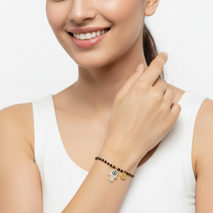 Evil Eye on Fatima’s hand with Om on mangalsutra chain in gold - Jewelslane