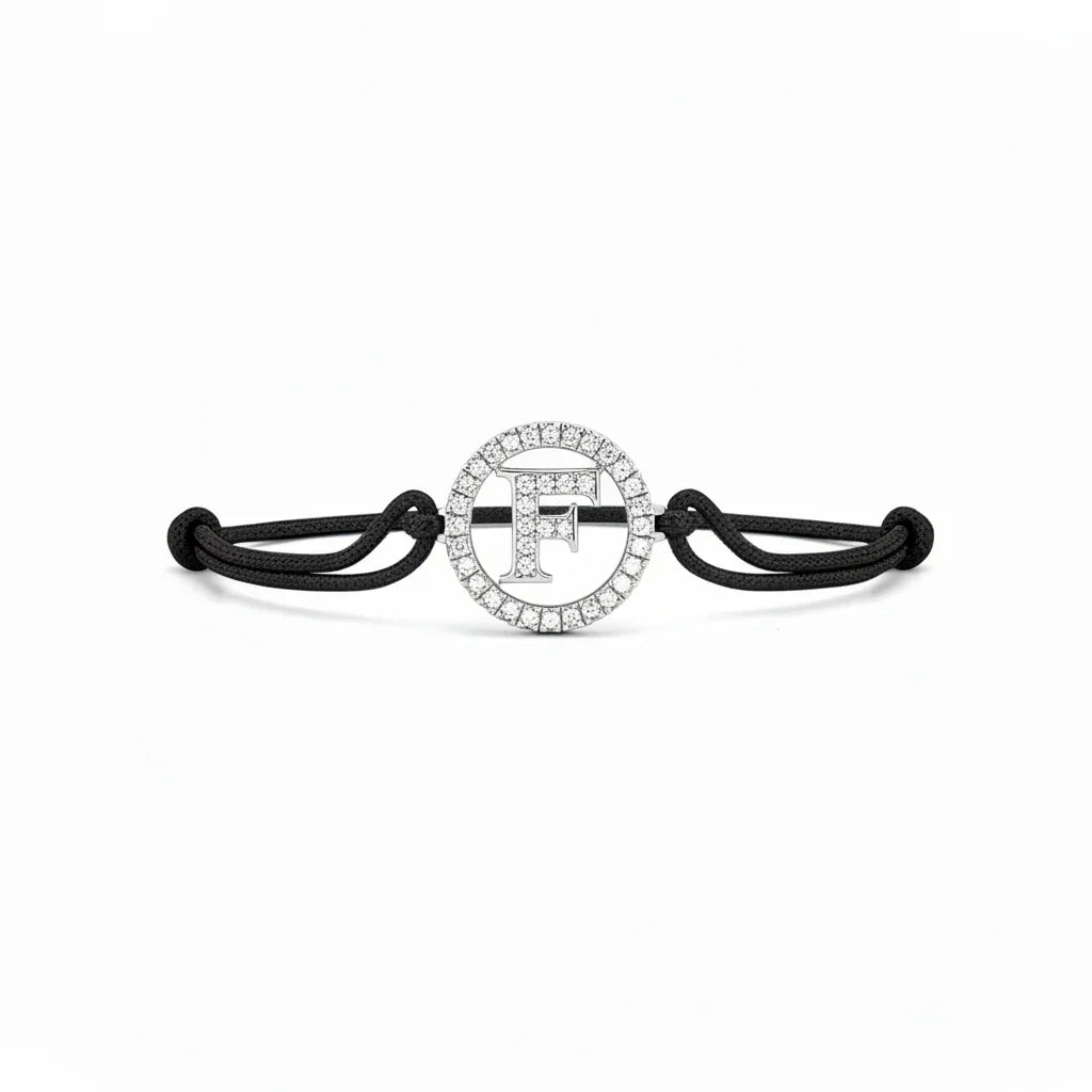 Silver diamond bracelet with letter F pendant on black adjustable cord