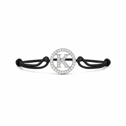 Silver diamond bracelet with alphabet K charm on black adjustable cord