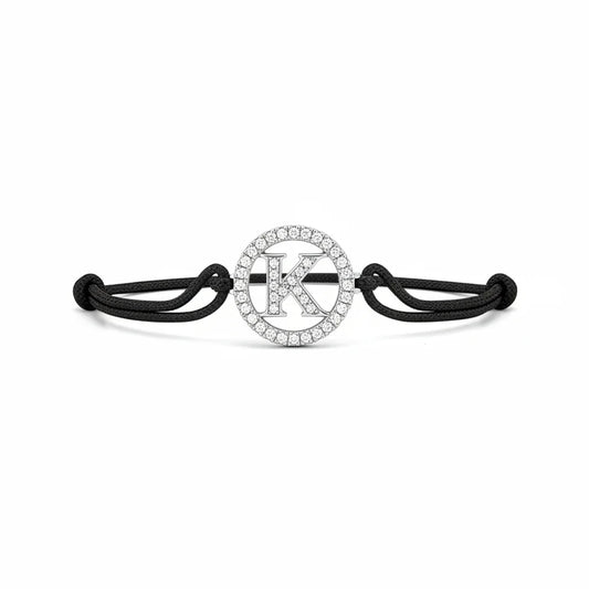 Silver diamond bracelet with alphabet K charm on black adjustable cord
