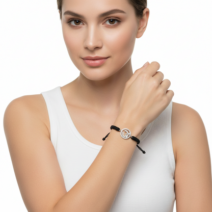 Aum Bracelet in Silver with Diamonds on Nylon Braided Thread from Aumkaara