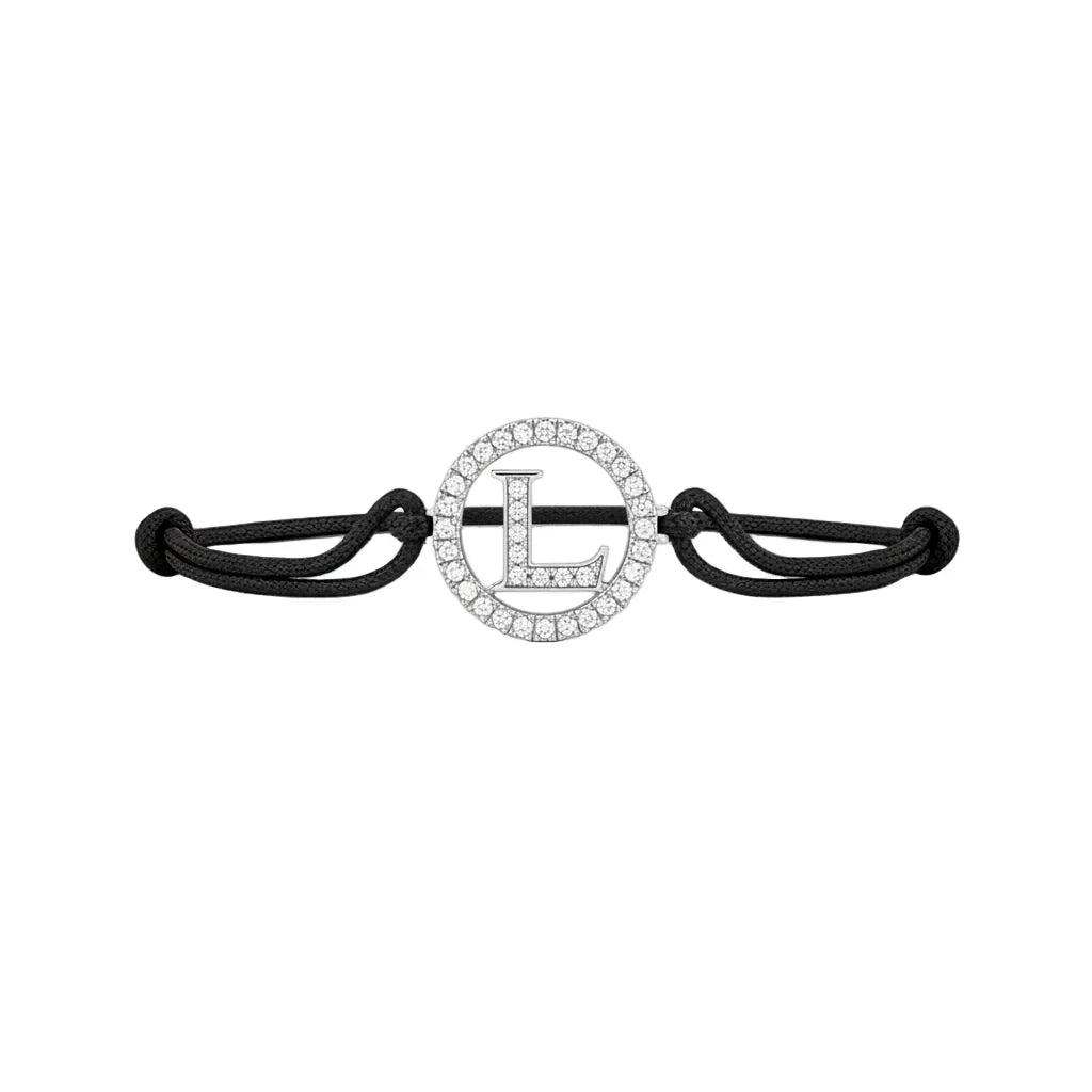 Diamond alphabet L silver bracelet with black adjustable cord on white background