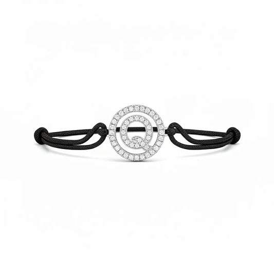 Silver diamond Q letter bracelet with black adjustable cord on white background