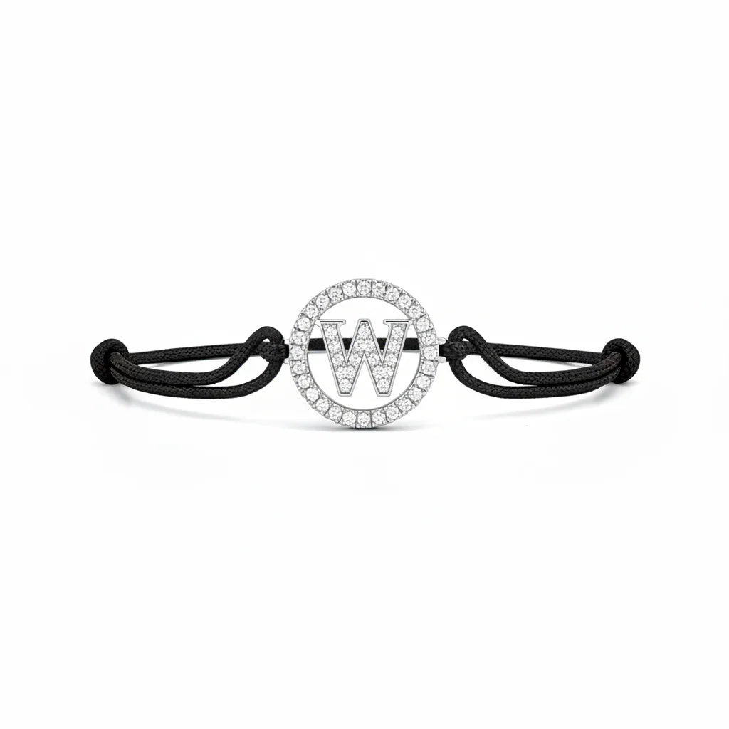 Diamond letter W bracelet with black adjustable cord and circular silver setting