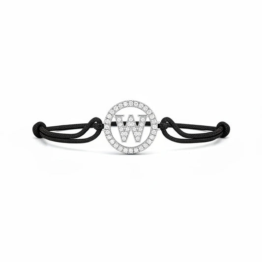 Diamond letter W bracelet with black adjustable cord and circular silver setting