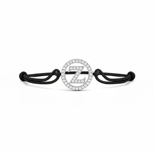 Diamond-encrusted letter Z pendant on black cord bracelet, elegant statement jewelry for men or women