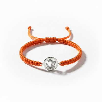 Aum Bracelet in Silver with Diamonds on Nylon Braided Thread from Aumkaara