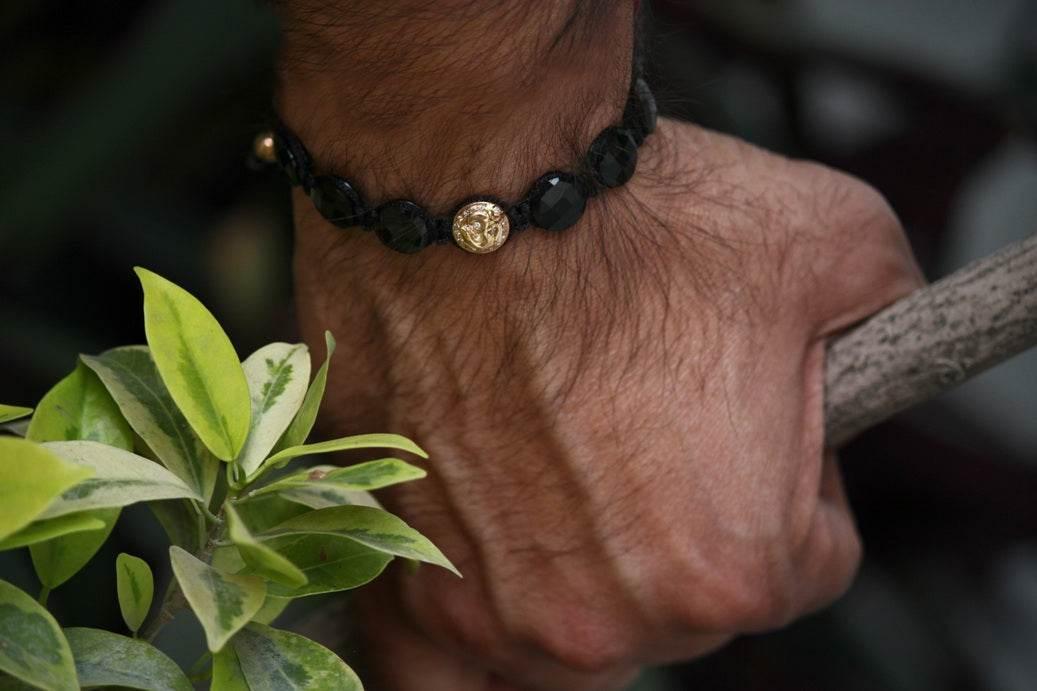 Om Gold & Black Onyx Bracelet - Jewelslane