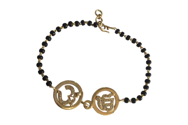 Om & Ik Onkaar joint bracelet in gold on mangal sutra chain