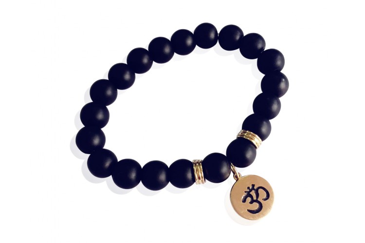 Aum bracelet in 14k gold on onyx beads