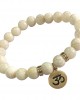 Aumkaara Tranquility Bracelet in gold with White Agate crystal beads