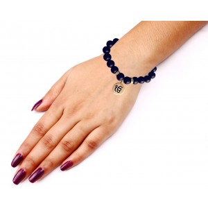 Gold Ik onkar bracelet in 14k on onyx beads