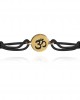 Auspicious Om Bracelet in 14k Gold for New Born Baby on adjustable black thread nazaria