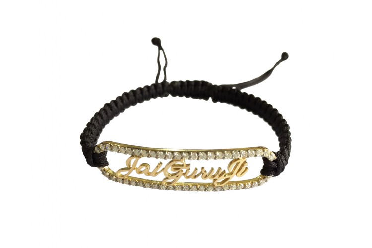 14k hallmarked gold Jai Guru JI bracelet with diamonds