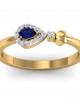 Buy Anchita Sapphire Ring in 14k hallmarked gold and studded with a Pear Shape Natural Sapphire and Diamonds