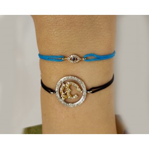 Evil Eye charm bracelet with Diamonds & Sapphire in Gold